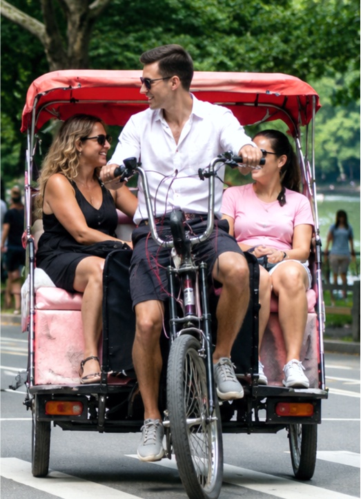 Is Central Park Pedicab Tour Worth It? Honest Guide 2026 1 Couple enjoying a Central Park pedicab tour